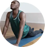 Man doing yoga at home.