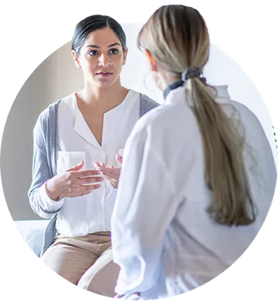 Doctor speaking with her patient.