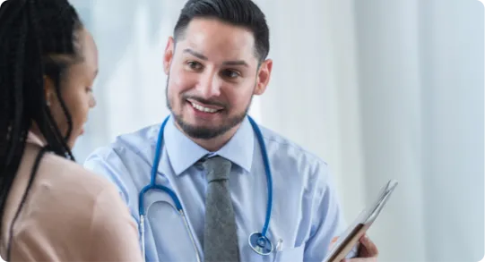 Doctor going through a checklist with the patient.