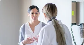 Doctor speaking with her patient.