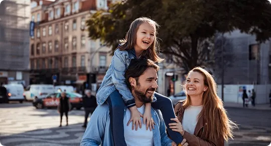 Family walking down a street.