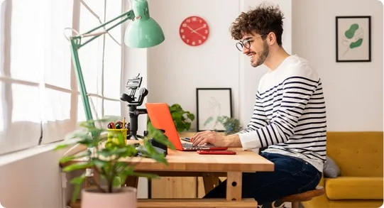 Man working on his laptop.