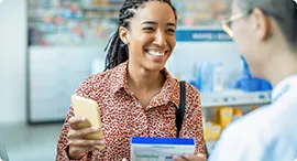 Patient speaking with a pharmacist.