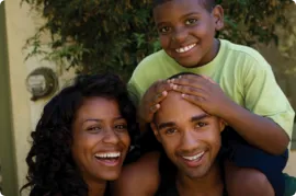 Family taking a picture together.